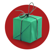 A Christmas present wrapped in green paper and tied with thin grey twine against a vibrant red gradient circle.