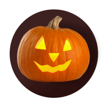 A classic jack-o-lantern carved with simple triangle eyes, nose, and toothy grin against a dark brown gradient circle.