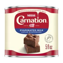 Front Center view of CARNATION Vitamin D Added Evaporated Milk 5 fl. oz. Can NET 5 FL OZ (147 mL) (bilingual) product.