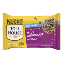 A bag of milk chocolate morsels with a purple label and a melty oatmeal chocolate chip cookie.